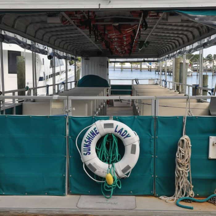 Interior of Sunshine Lady pontoon boat used for Indian River eco-tour in Florida.