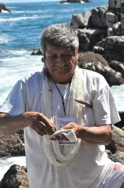 Habacuc Avendano applying snail dye