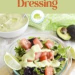 Green salad with avocado dressing with Pinterest text overlay.