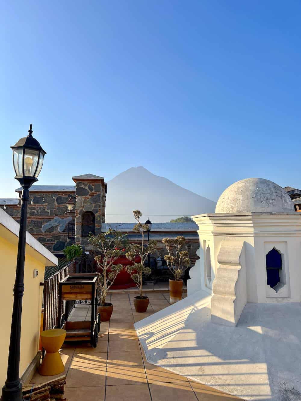 Enjoy a fantastic view of Agua Volcano from the rooftop terrace at Hotel Mestizo.