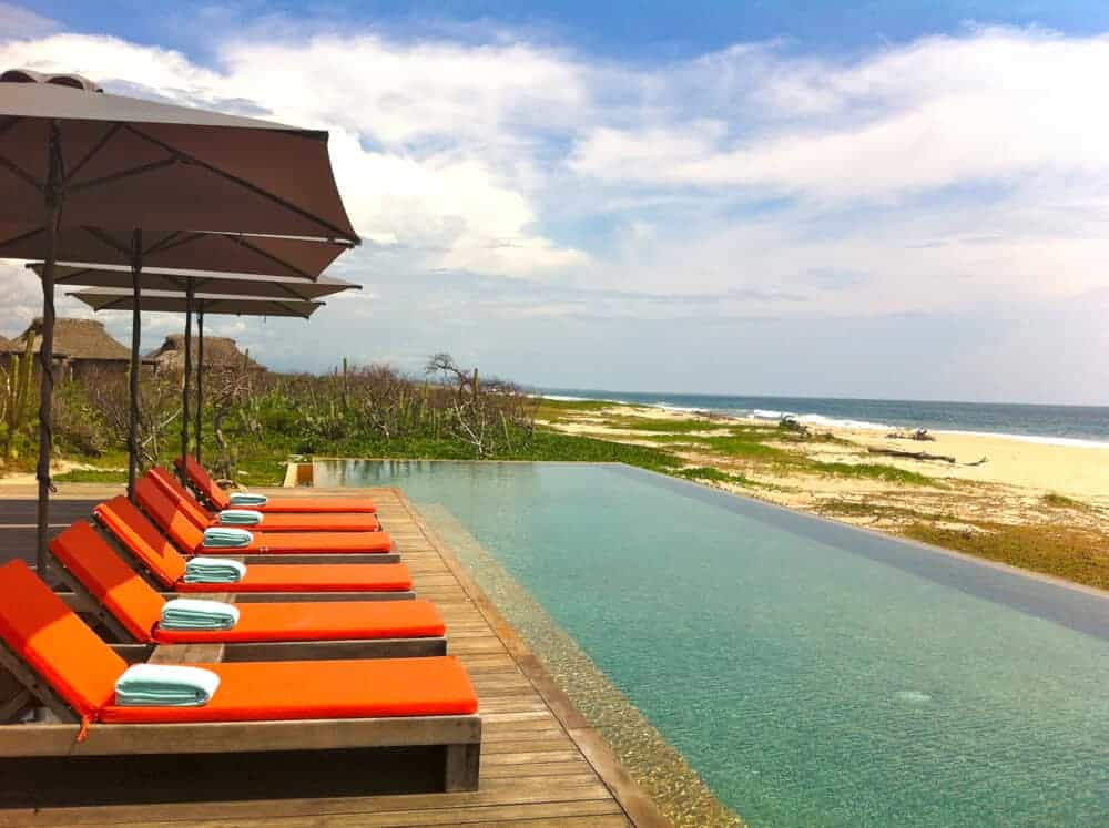 Lounge chairs by the pool at Hotel Escondido, Oaxaca Mexico.
