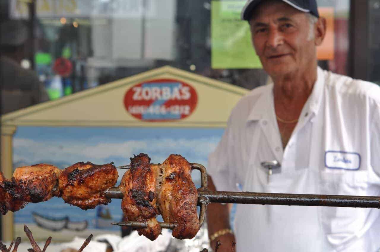 Qual cooking on a spit during Taste of The Danforth in Greektown, Toronto.