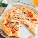 A baked pizza featuring beer pizza dough and toppings.