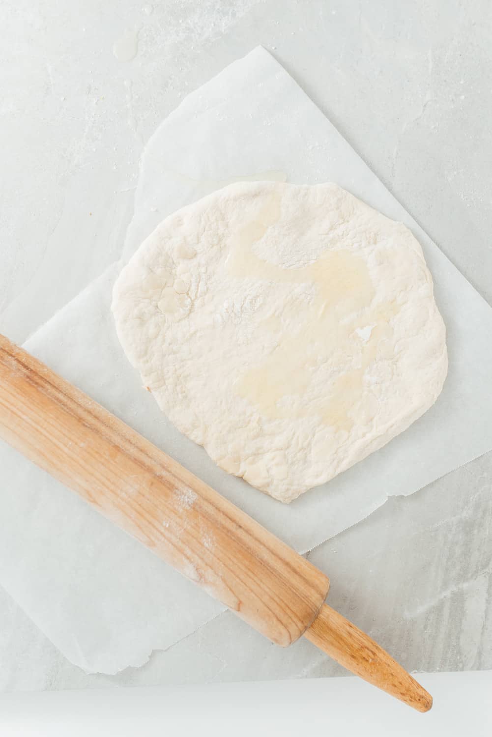 Roll the dough out with a rolling pin. 