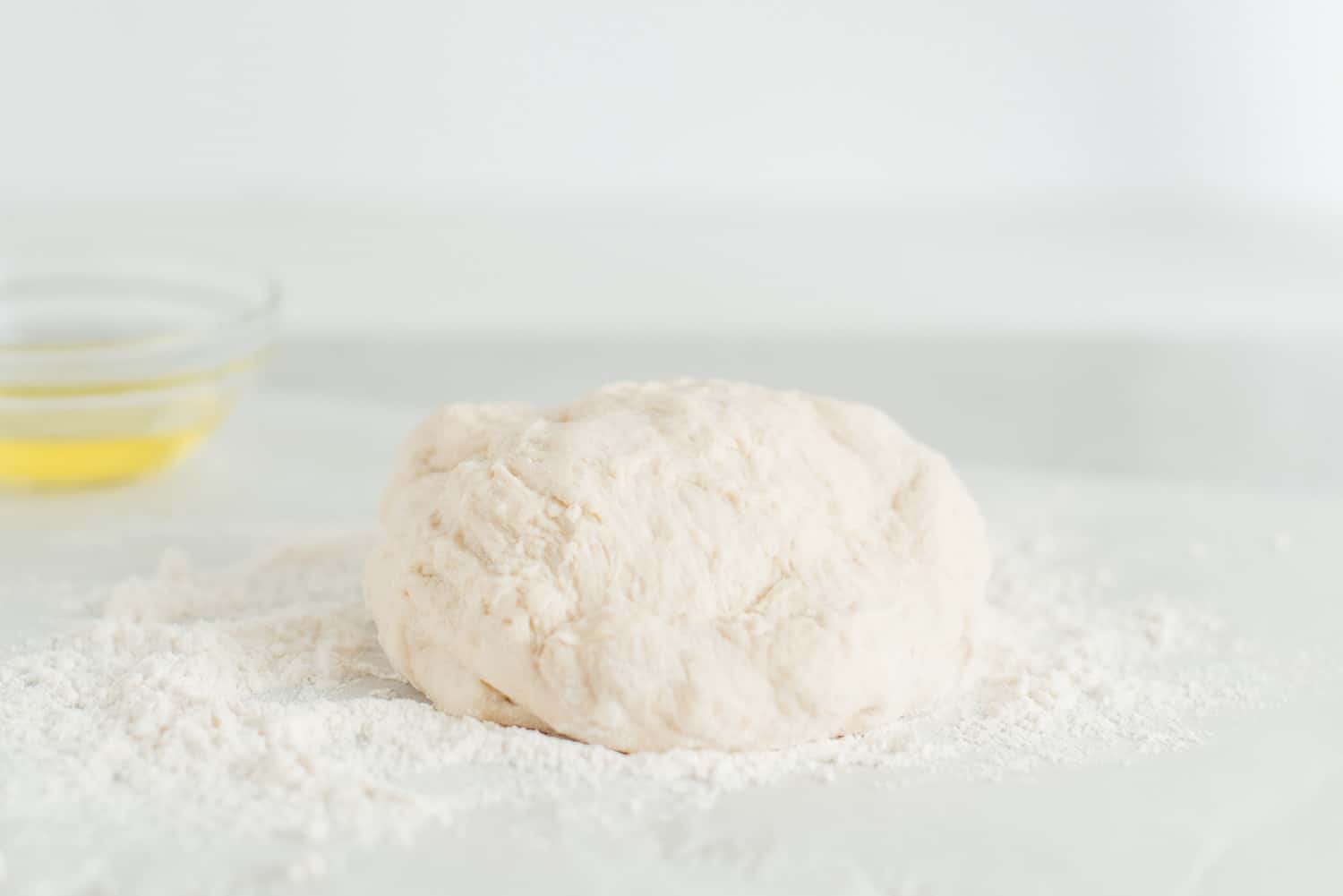 Kneading dough on a floured surface.