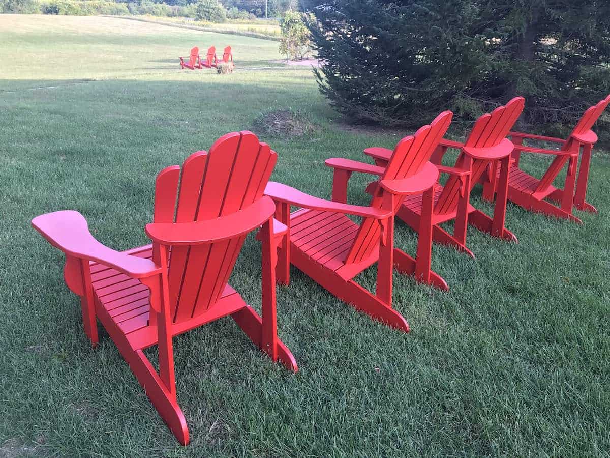 Red adirondack chairs in Peterborough & The Kawarthas.