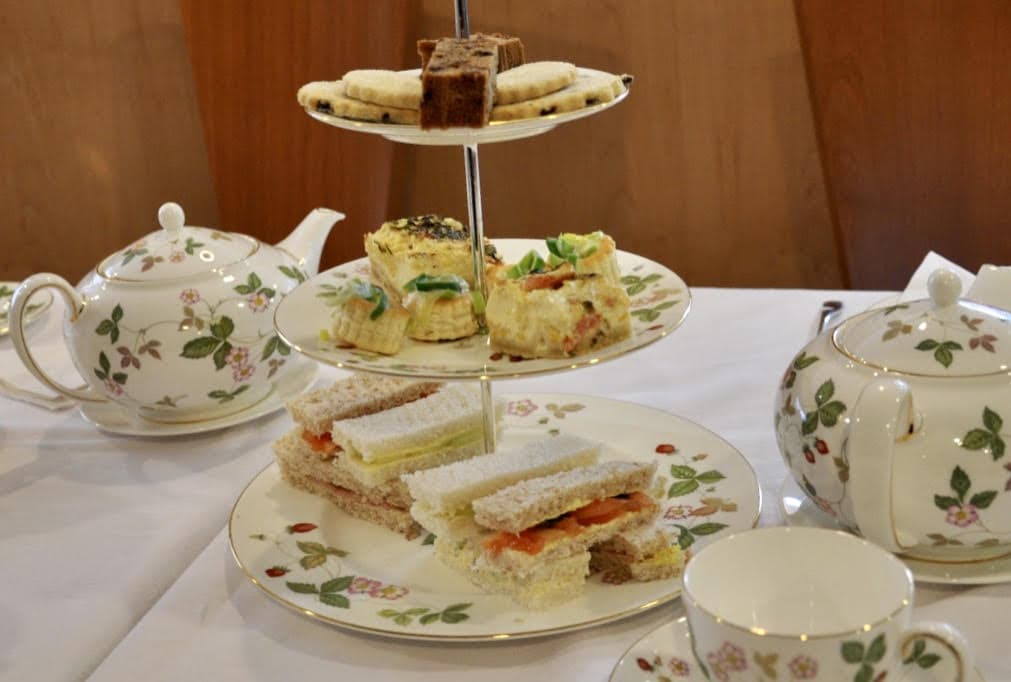 Afternoon tea is served on Wedgwood china.