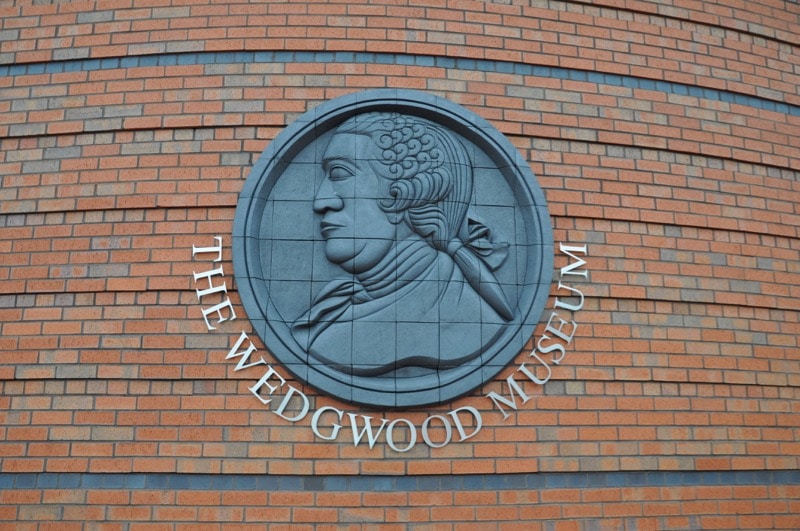 Emblem on a brick entrance wall of the Wedgwood Museum of Josiah Wedgwood, the founder of Wedgwood. 