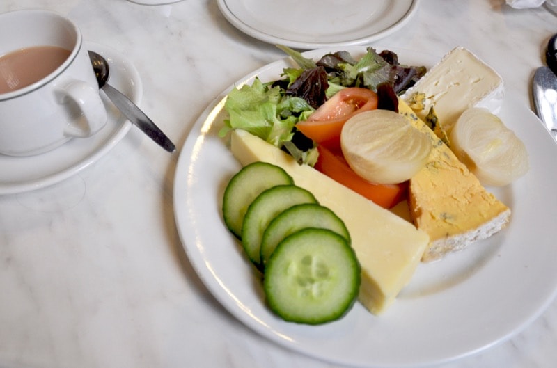Ploughman's Lunch of cheeses, salad and chutney in Stoke on Trent, UK.