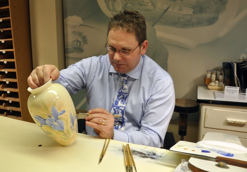 Artisan painting a jar during a Wedgwood Factory Tour.