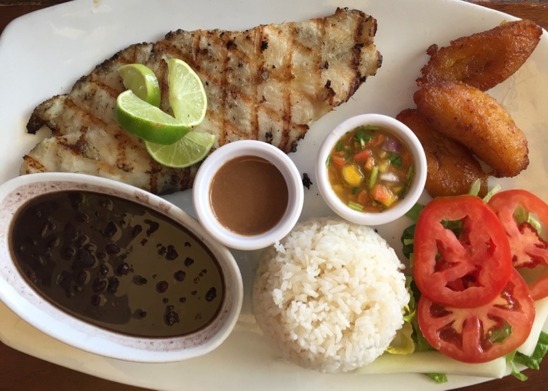 grilled grouper with fresh mango salsa and sweet fried plantain at Cuba's Cookin' in Aruba. 