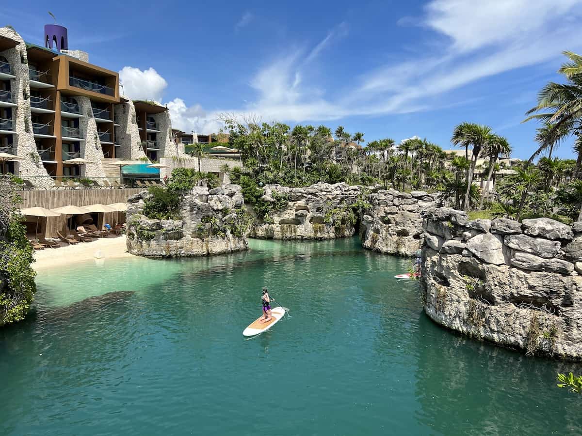 Person paddleboarding at Hotel Xcaret Arte in Mexico.