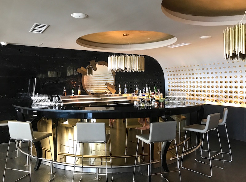 The glossy cocktail bar at Gastro Bar by MB at Paradisus Los Cabos. 