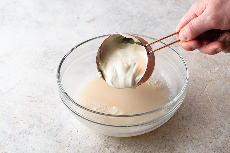 Mix the Greek yogurt and milk with the strained solids and gelatin