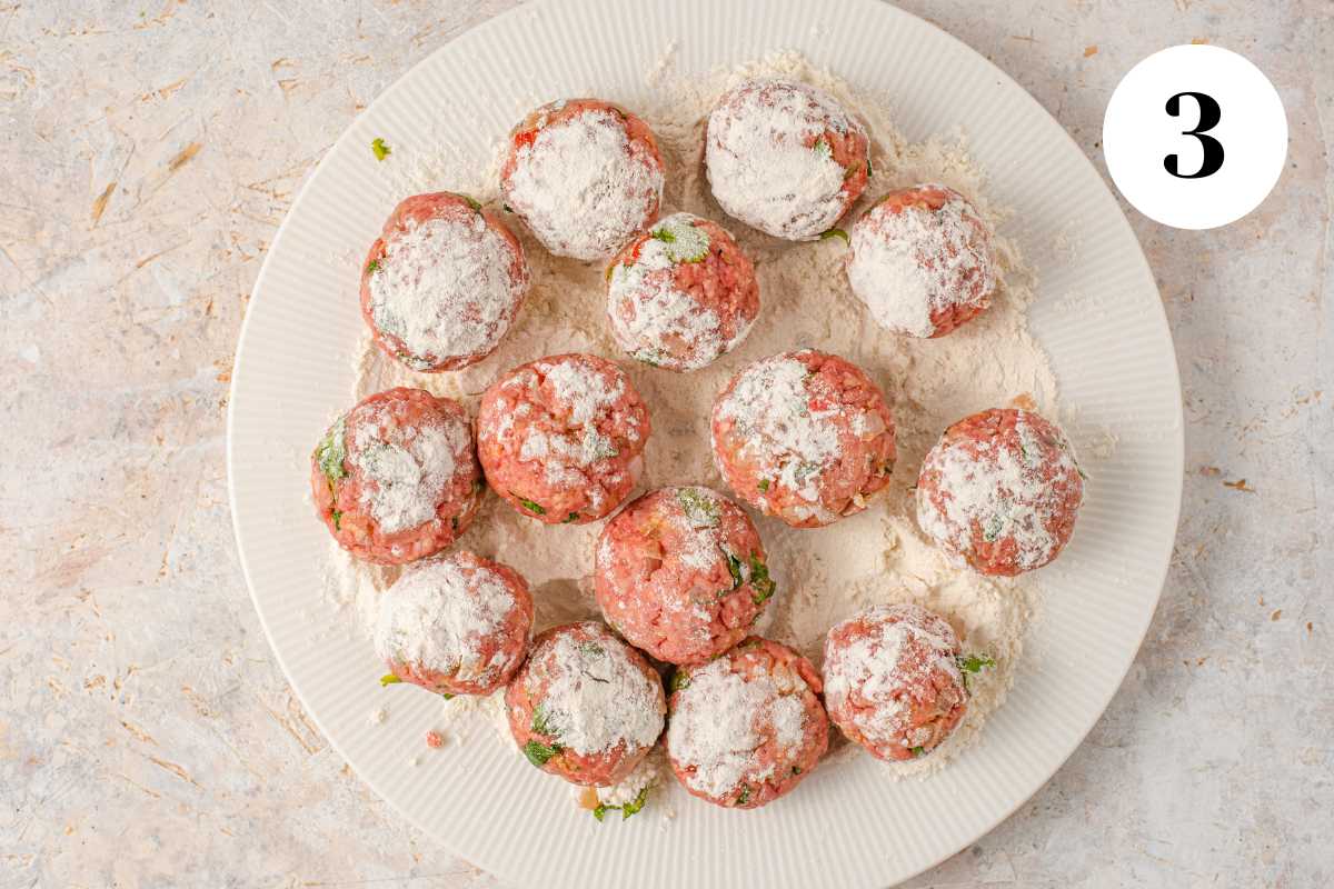 Meatballs on a platter to make meatball soup.