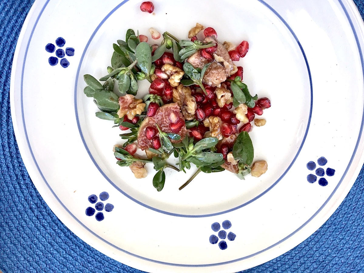 Italian Purslane salad with pomegranate, fig, walnut and quince