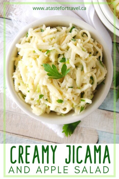 Jicama Apple Slaw in a white bowl with Pinterest text overlay. 