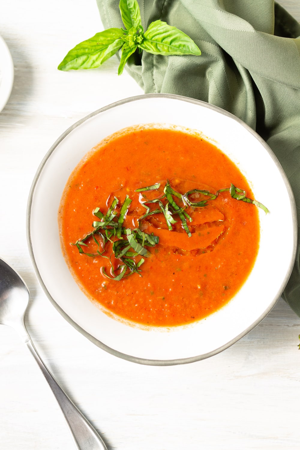 Heirloom Tomato Gazpacho in a bowl on a table.