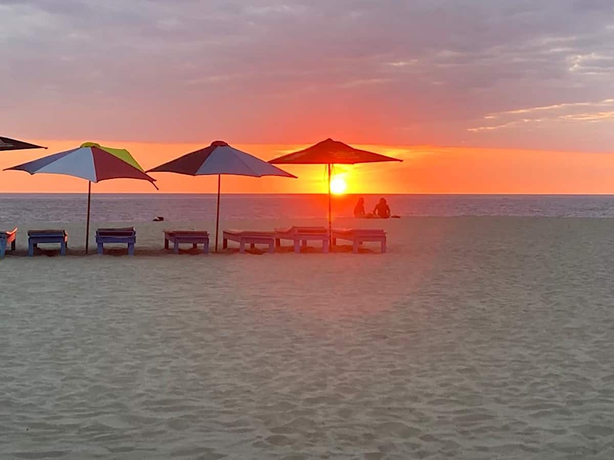 Umbrellas at sunset on Zicatela Beach in Puerto Escondido Mexico. 