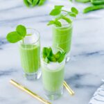 Chilled pea soup in shooter glasses.