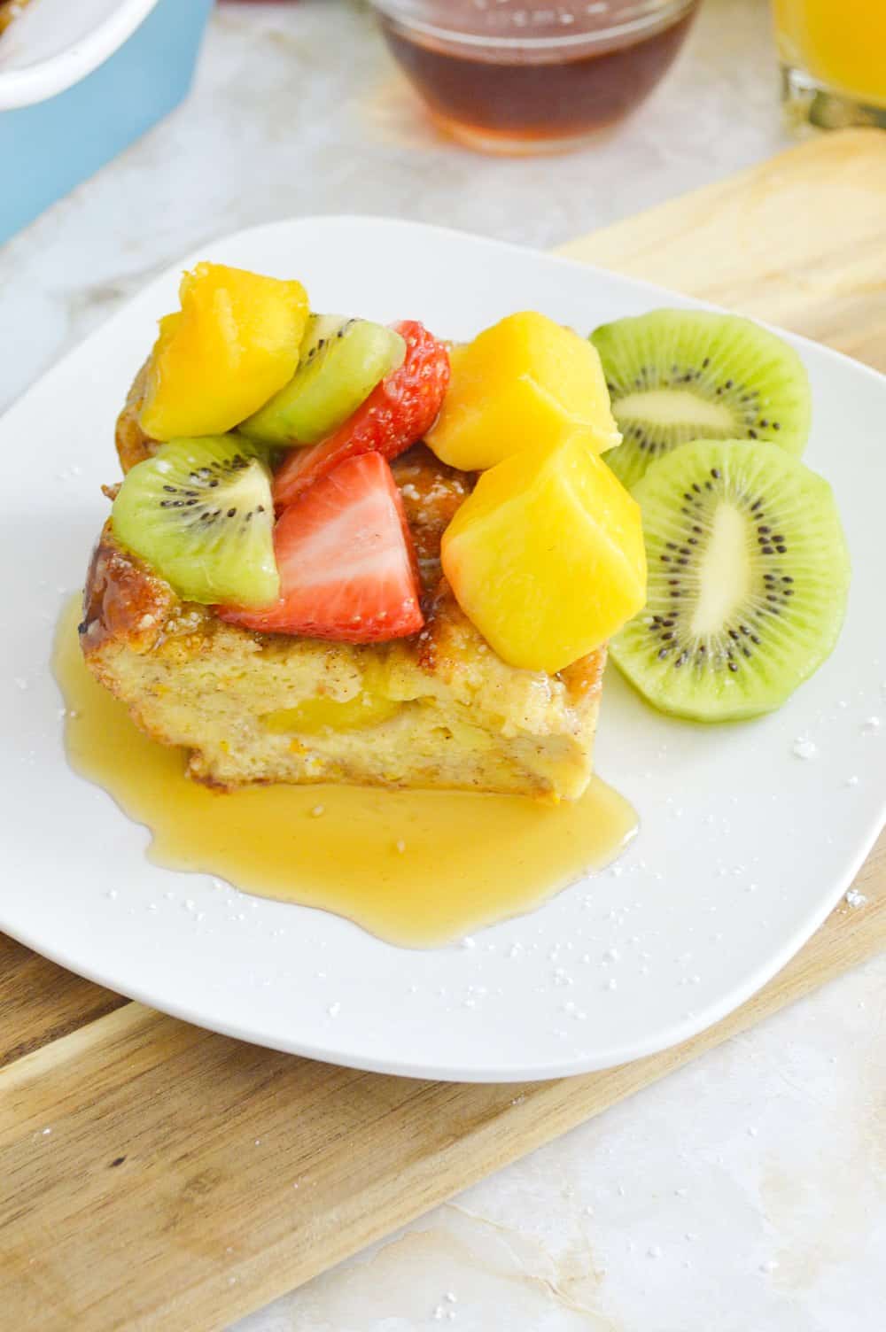 Slice of Bocado de Reina topped with Fruit. 
