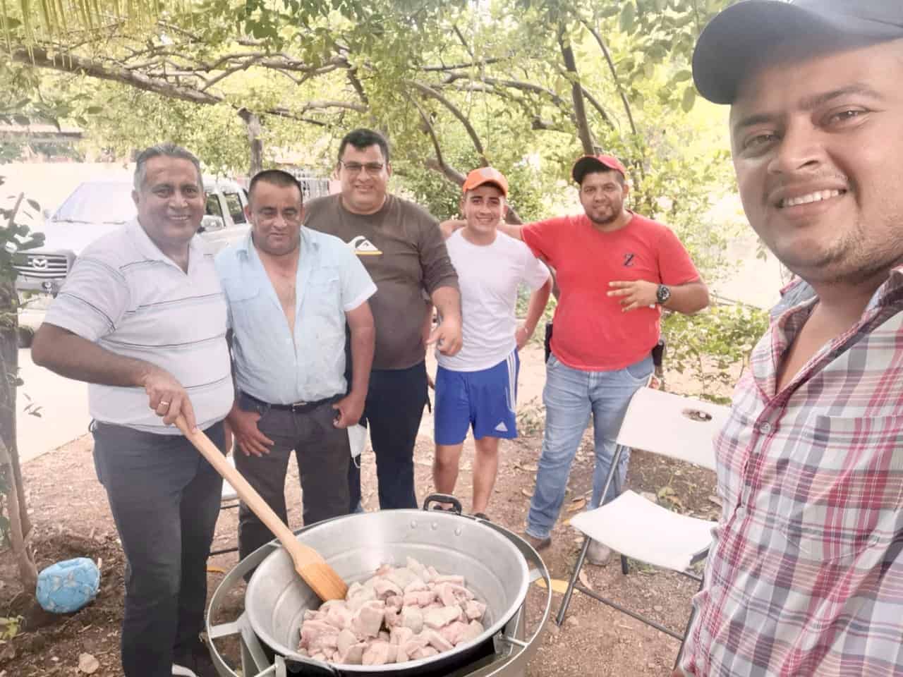 Making chicharrones outdoors in Guatemala.