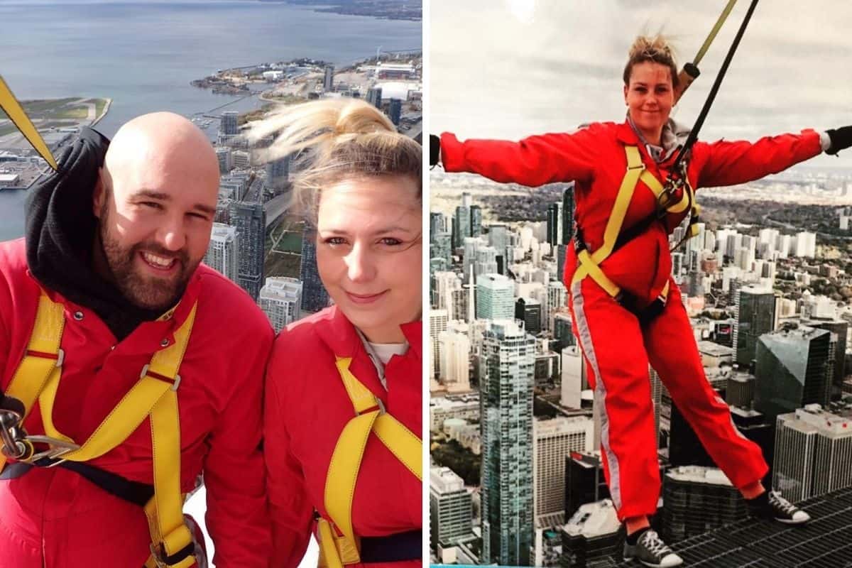 Young couple on the EdgeWalk at CN Tower.