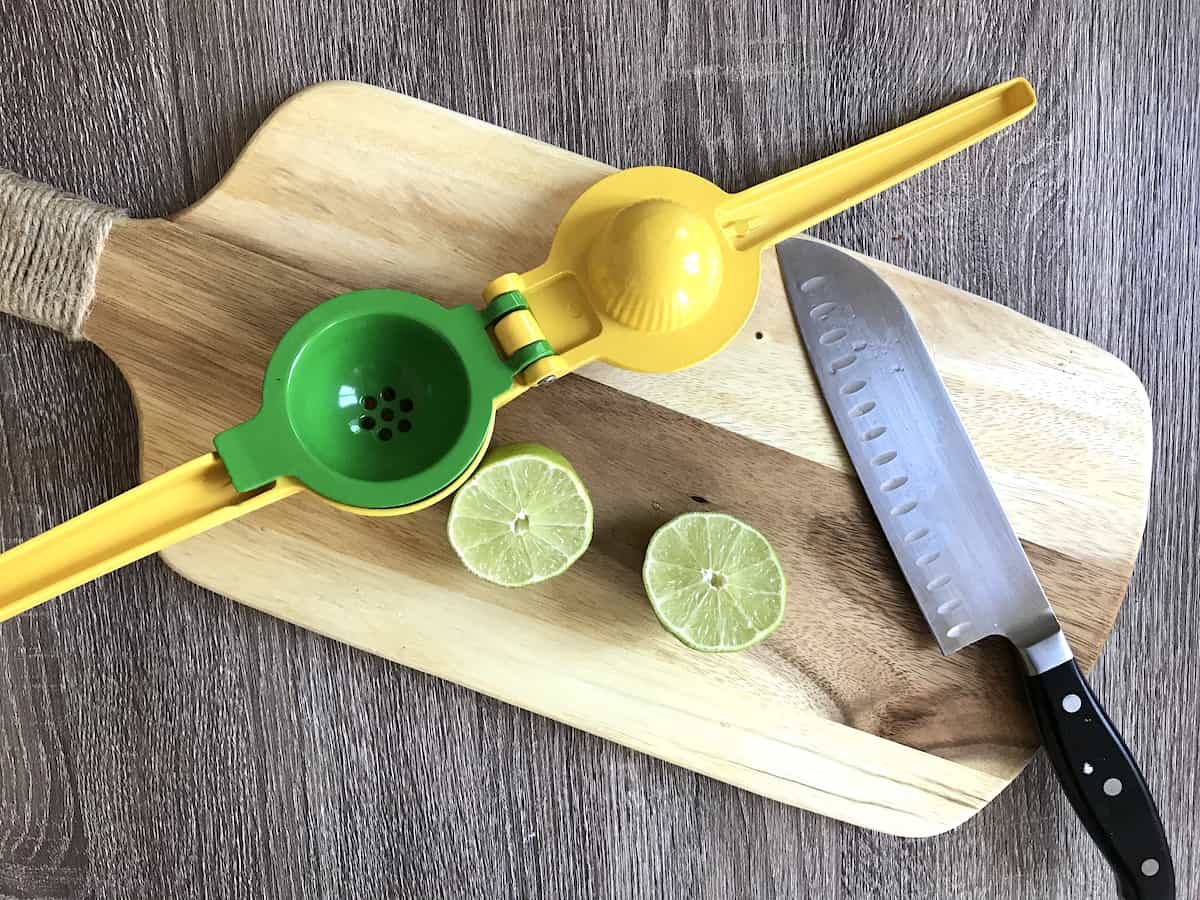 Cutting limes on a wooden board