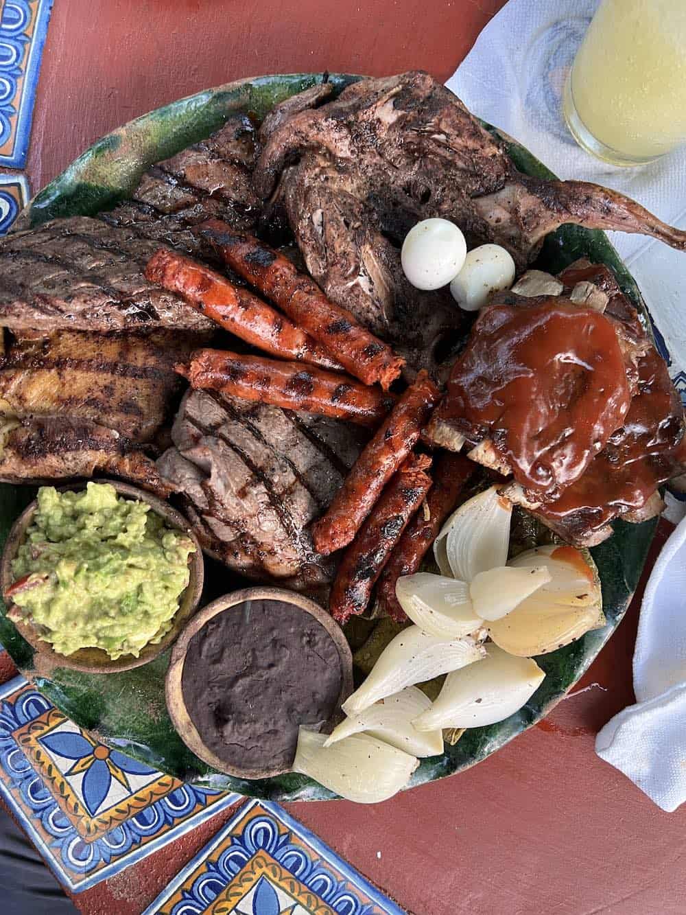 A platter of grilled meats at el rincon de los almendras restaurant in Puerto Escondido.