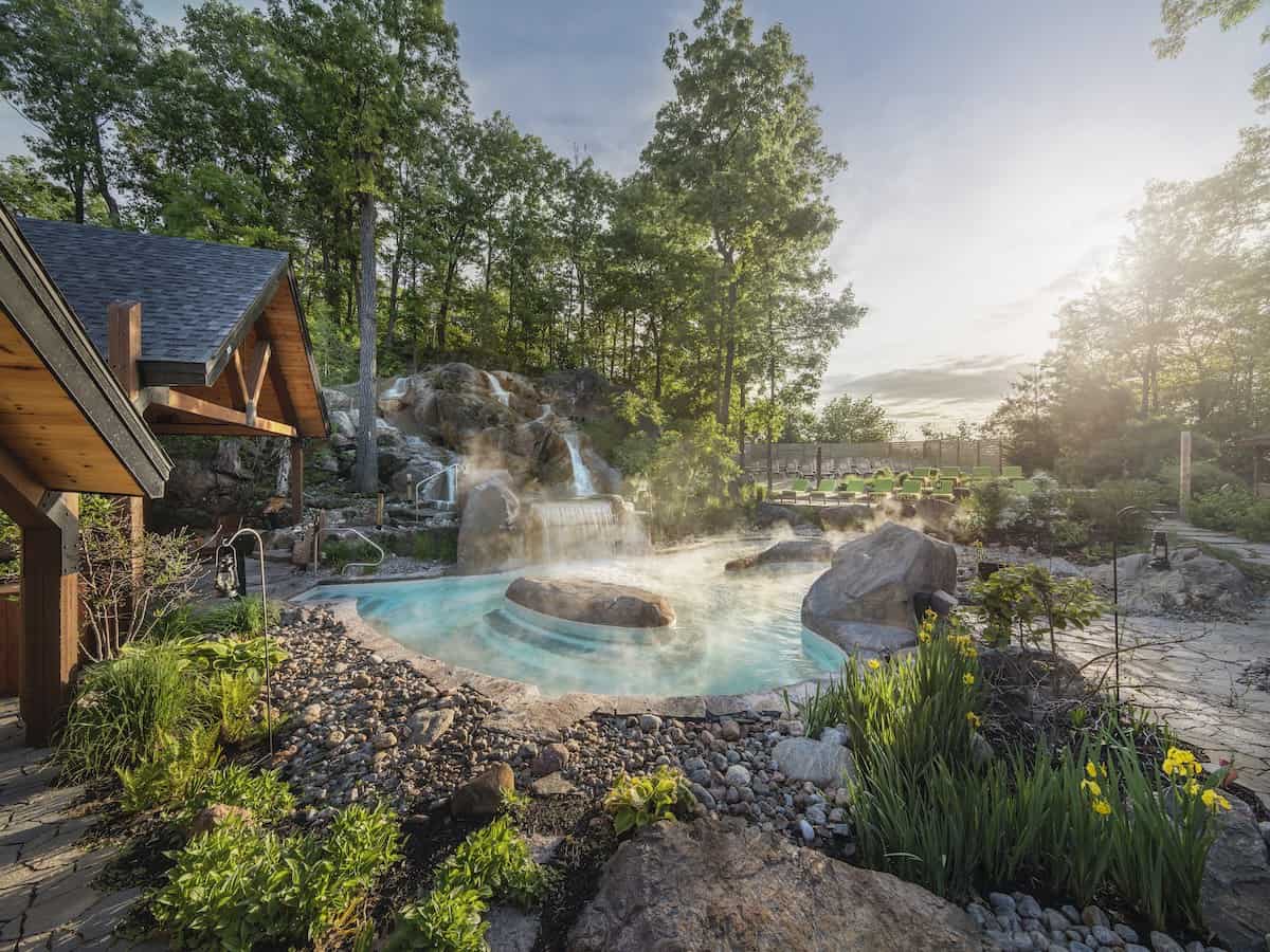 Summer view of pools at Nordik Spa-Nature.