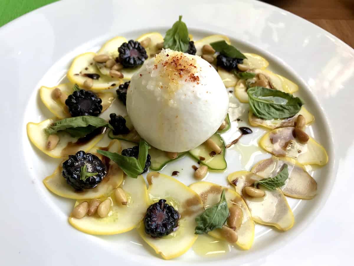 Burrata with seasonal accompaniments at Les Fougeres restaurant in Chelsea Quebec.