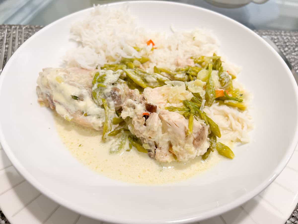 Chicken with loroco in cream sauce.