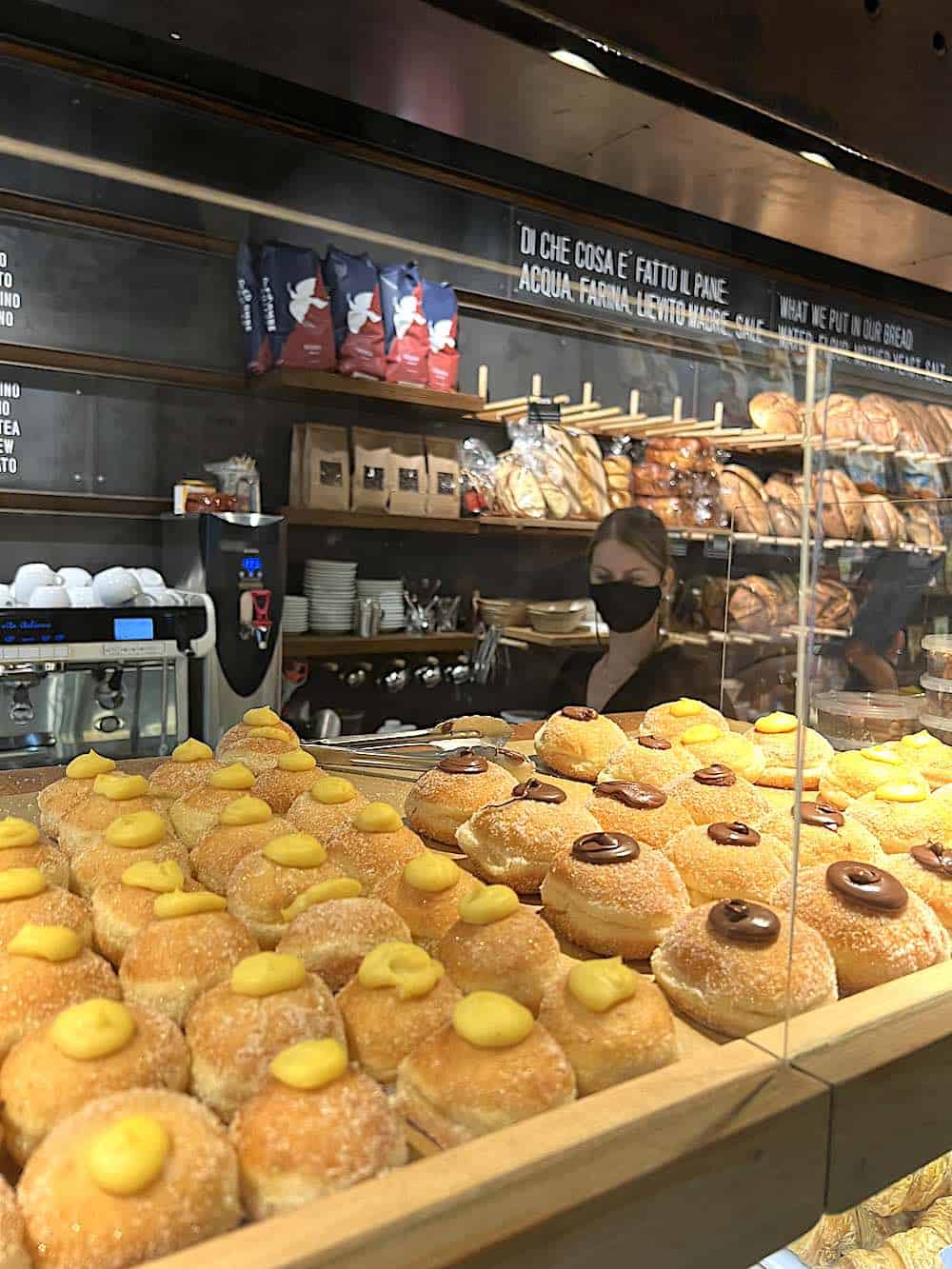 Pastries and bread behind a window in Toronto.