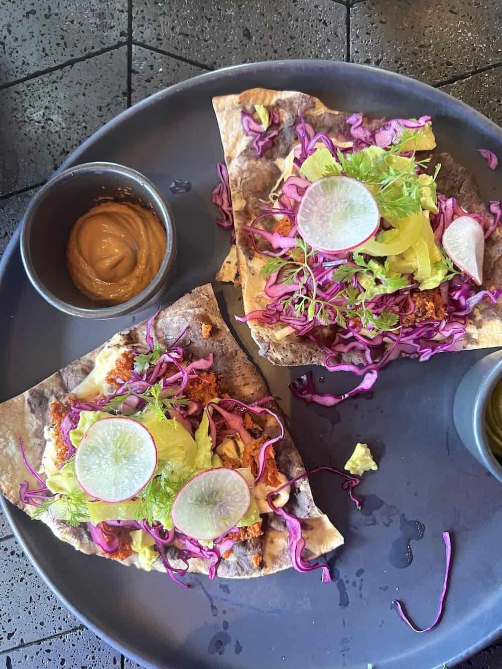 Fresh and healthy tlayuda served at the cantina restaurant at Hotel Xcaret Arte.