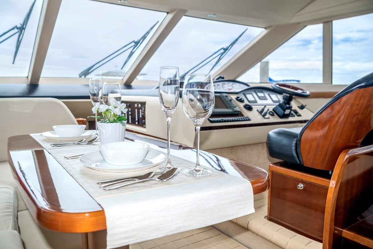 Interior of a yacht with wine glasses. a