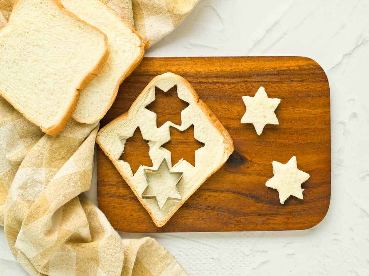 Cutting stars from the bread.