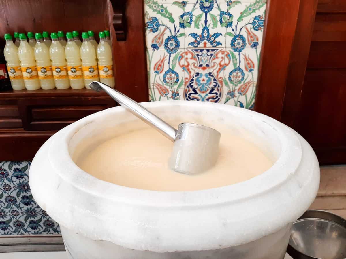 Vefa Bozacisi boza with ladle.