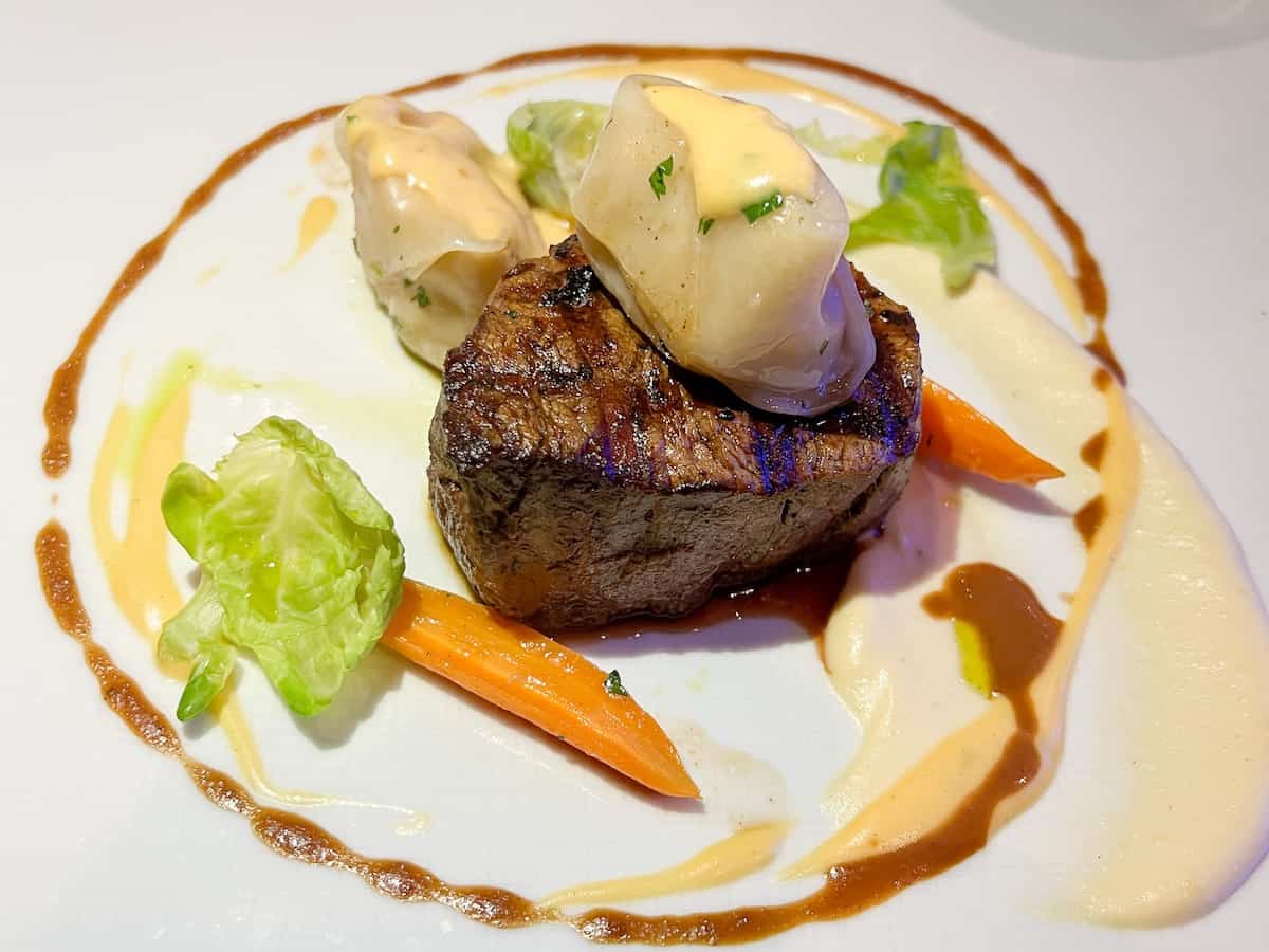 Steak with lobster dumpling at Pinnacle Grill.