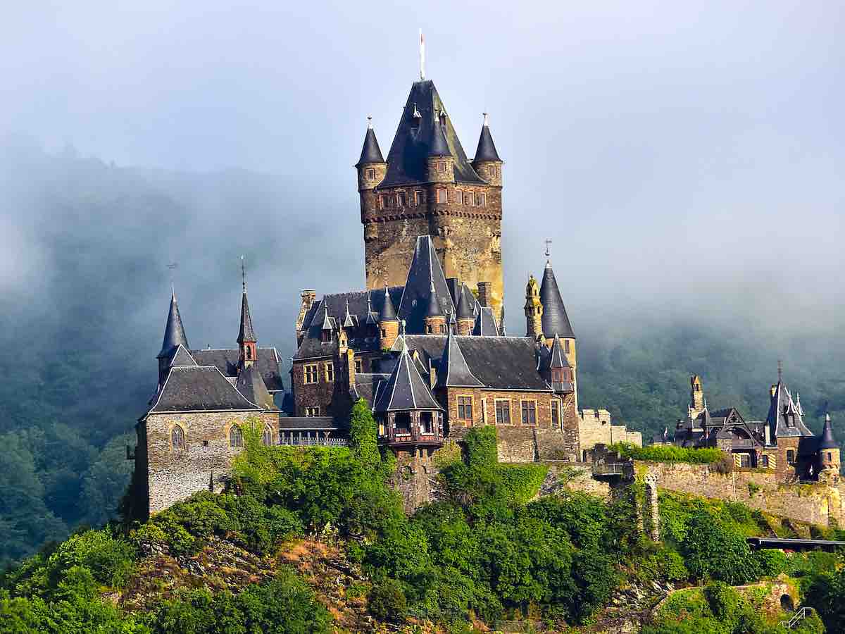 Reichsburg castle in Cochem Germany in the fog. 