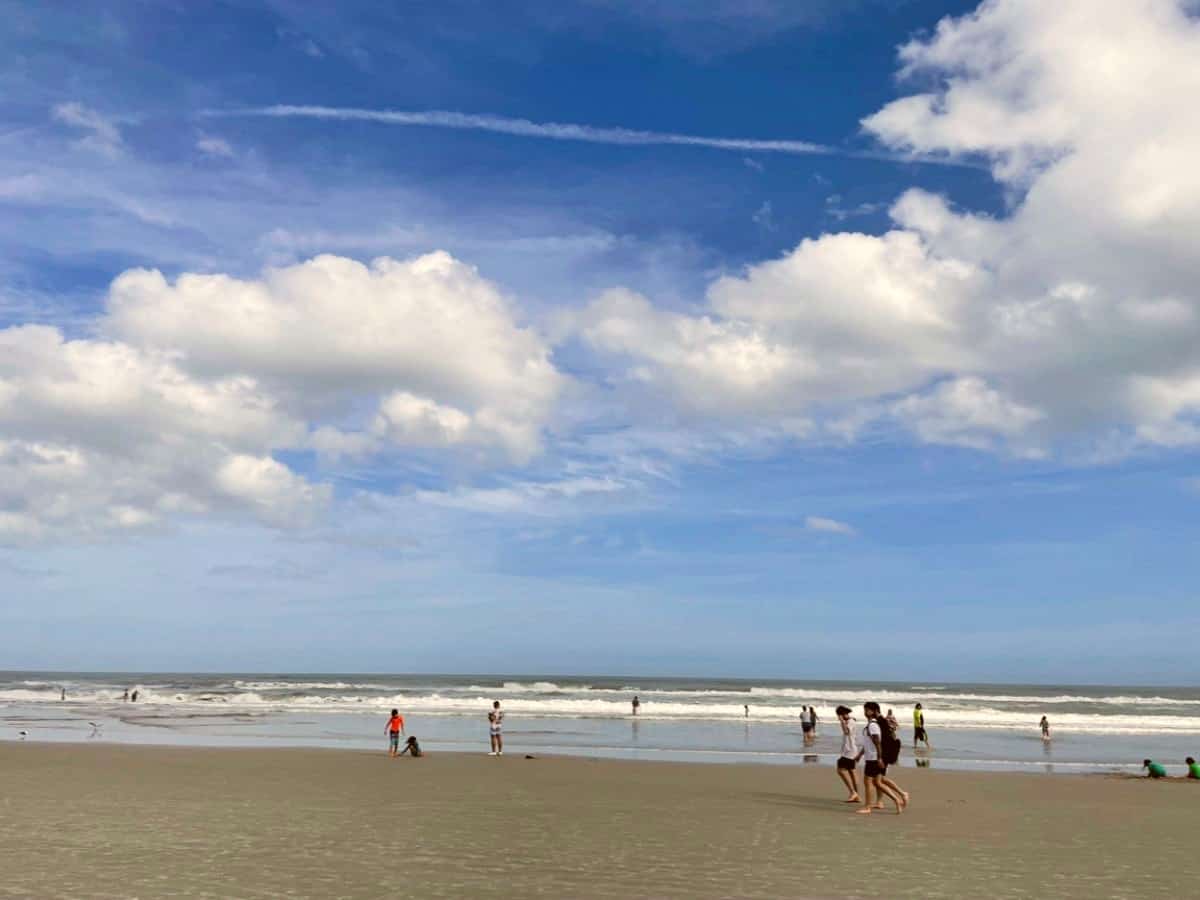 Beach and sky with tourist in Daytona Beach. Beach and sky with tourist in Daytona Beach.