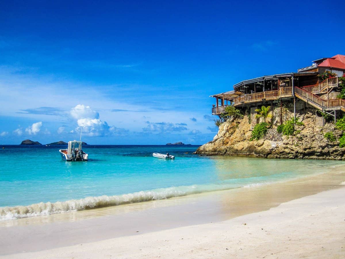 Ocean view with building on top of a rock. Ocean view with building on top of a rock.