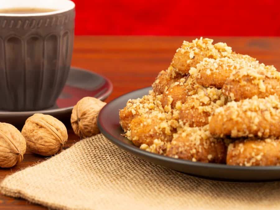 Melomakarona (honey cookies) on a plate at Christmas.