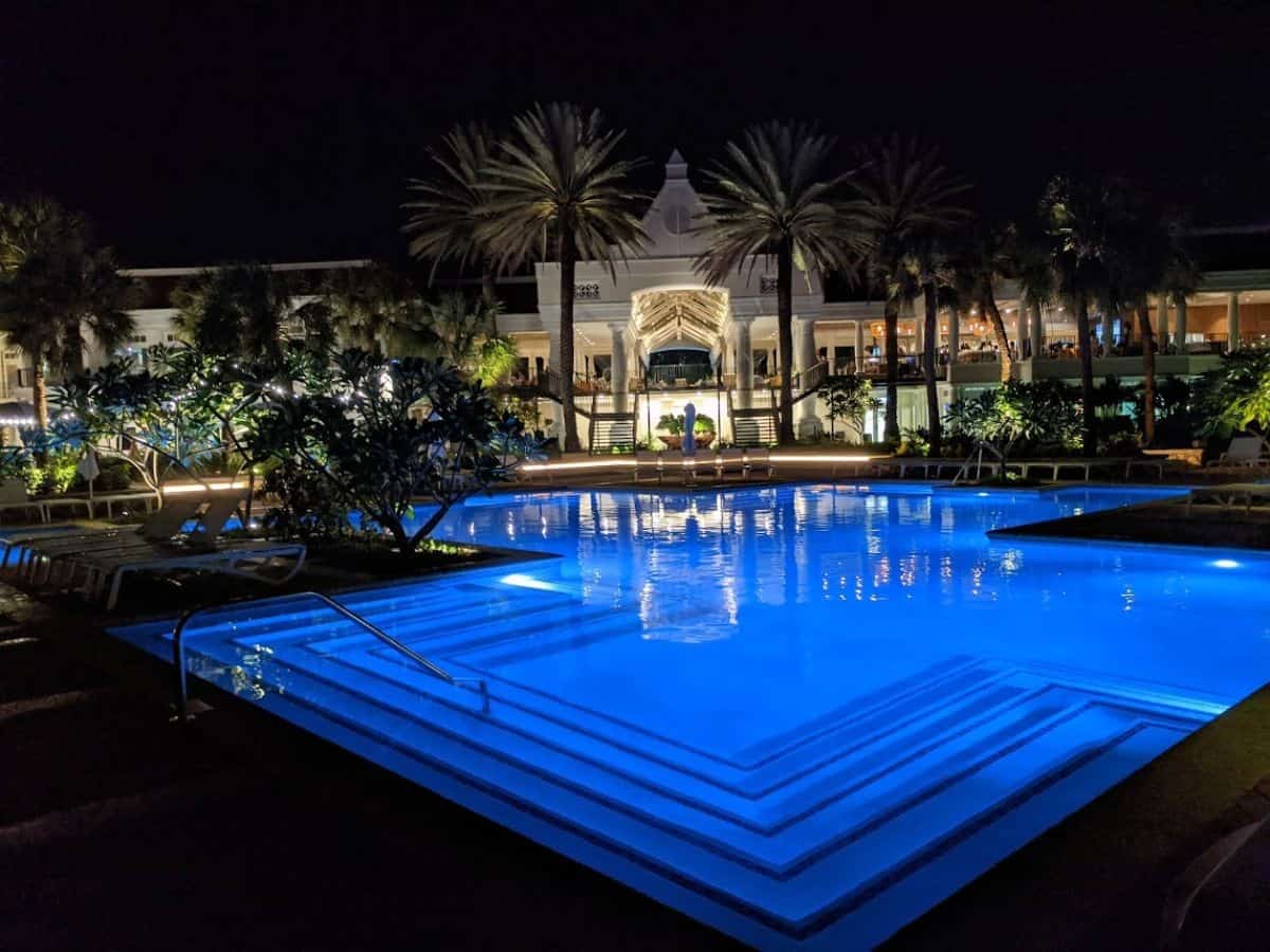 Curaçao Marriott Beach Resort's pool in the dark with blue lights. 