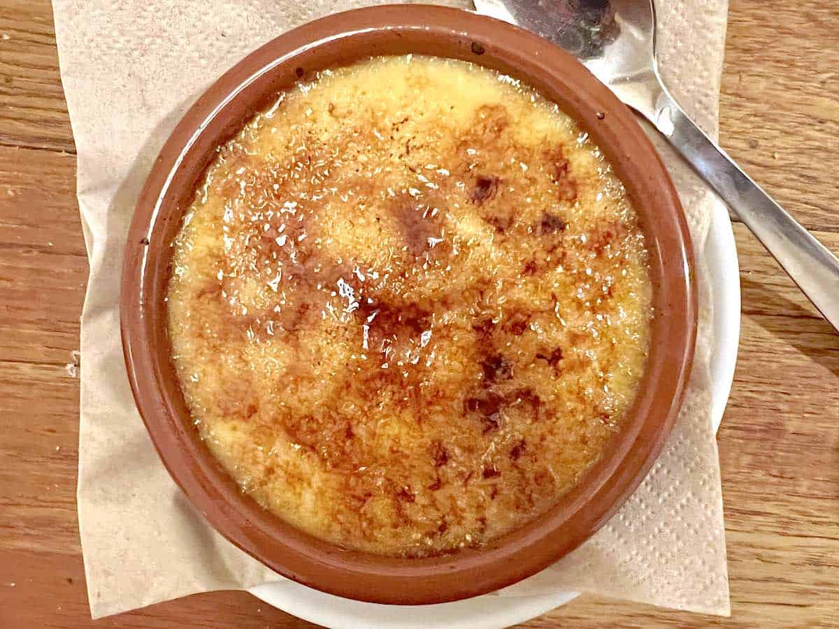 Crema catalana topped with a crust of burnt sugar served at Petritxo Cafe in Barcelona.