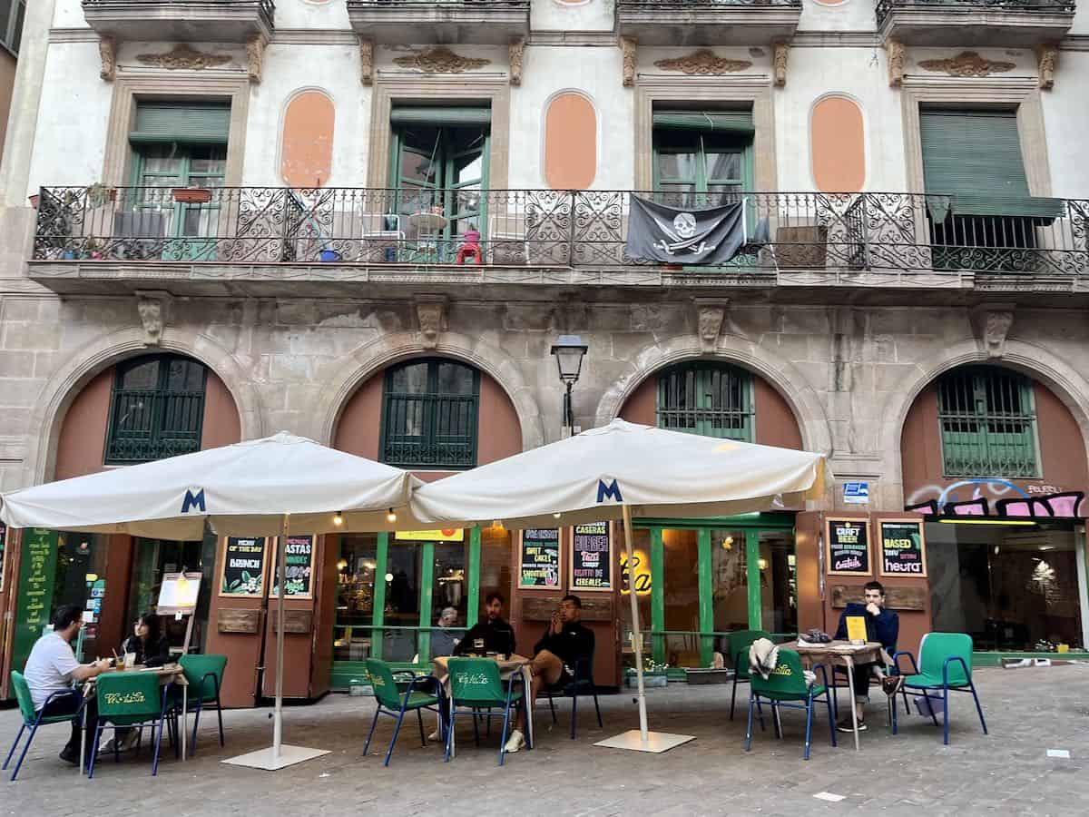 Outdoor terrace with umbrellas in Barcelona.