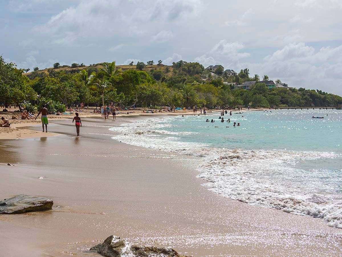 People walking along the shore at Pigeon Point.