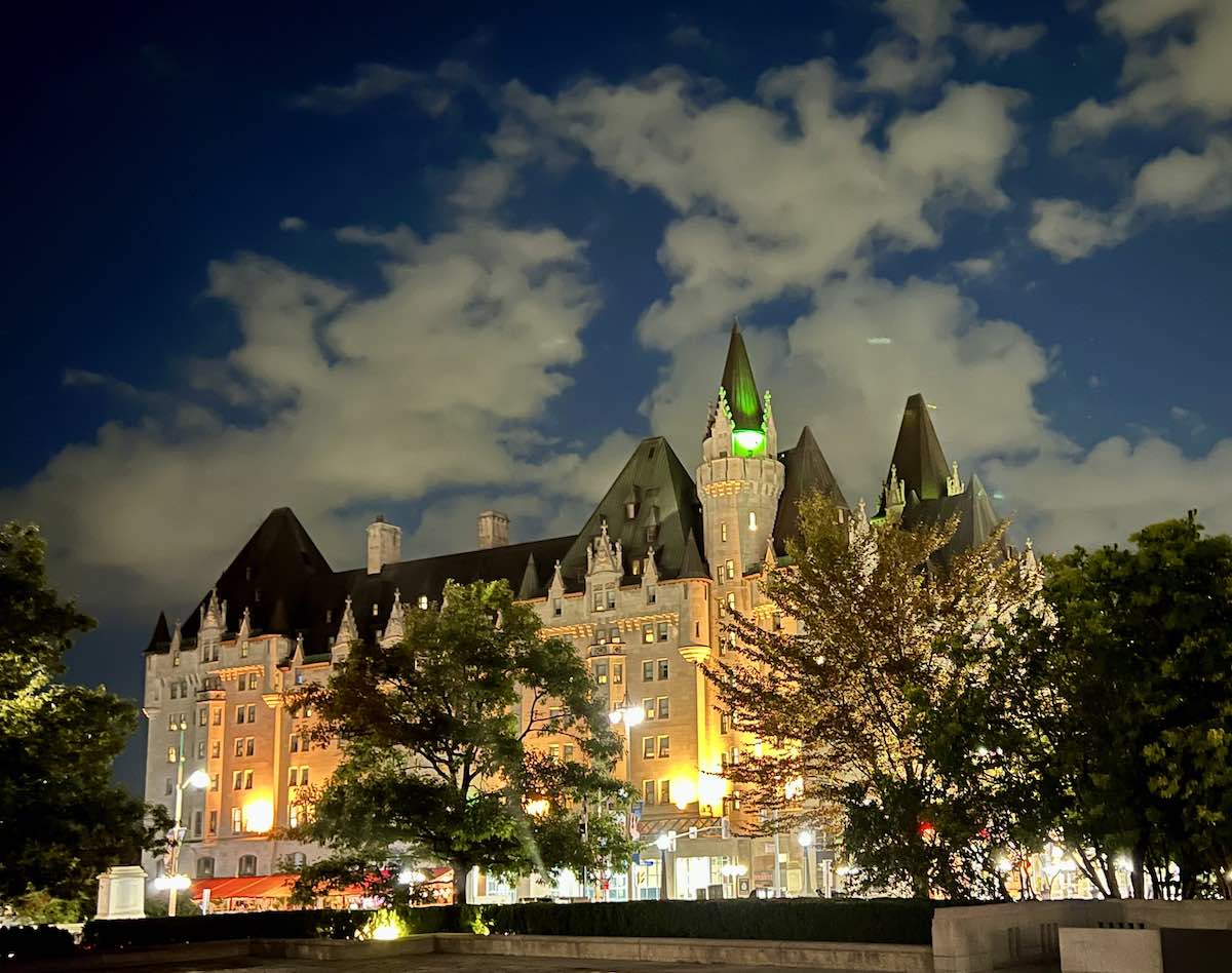 Château Laurier illuminated at night. 
