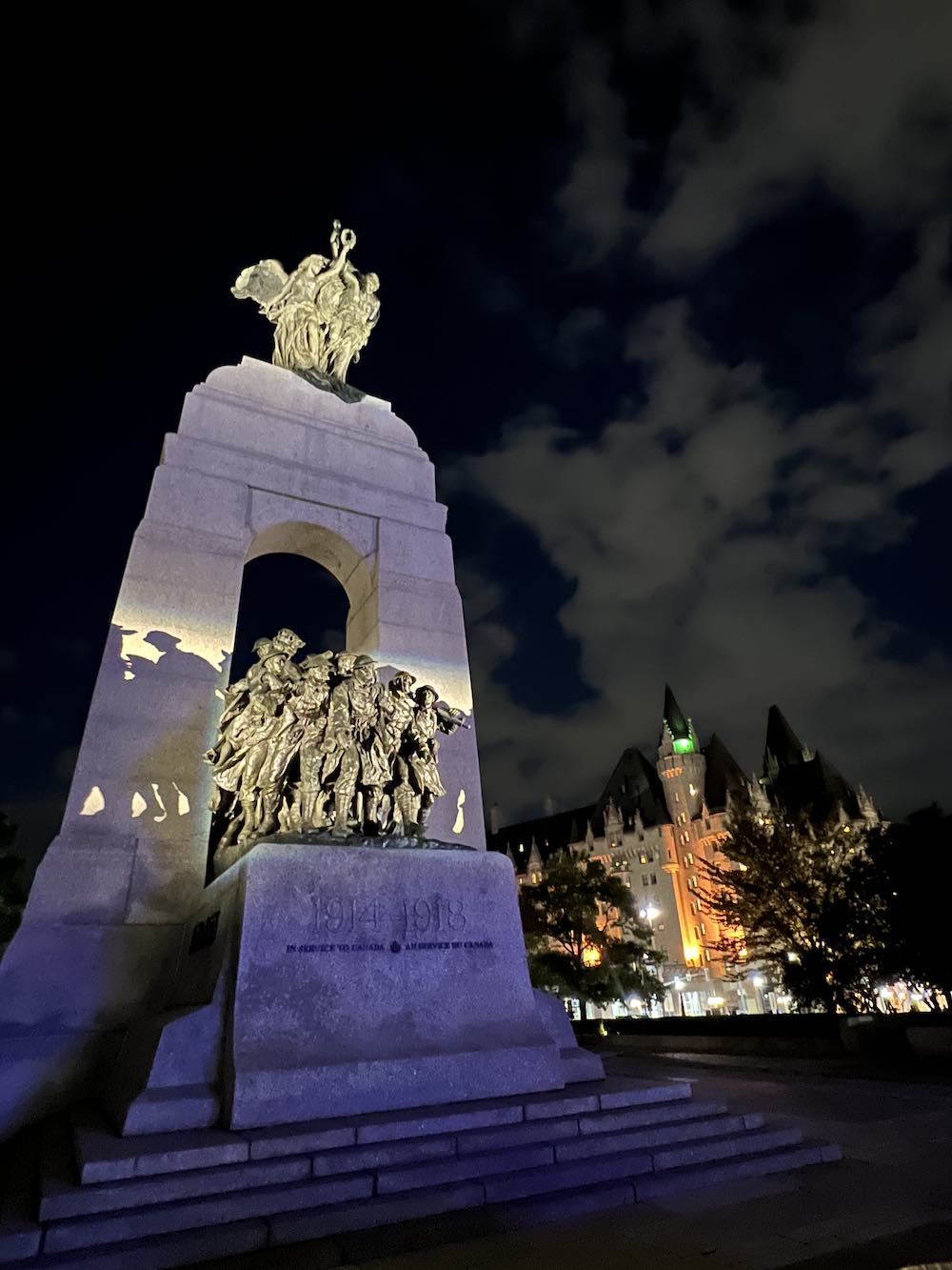 The National War Memorial, at the southern end of Confederation Square, adjacent to Confederation Park at night.