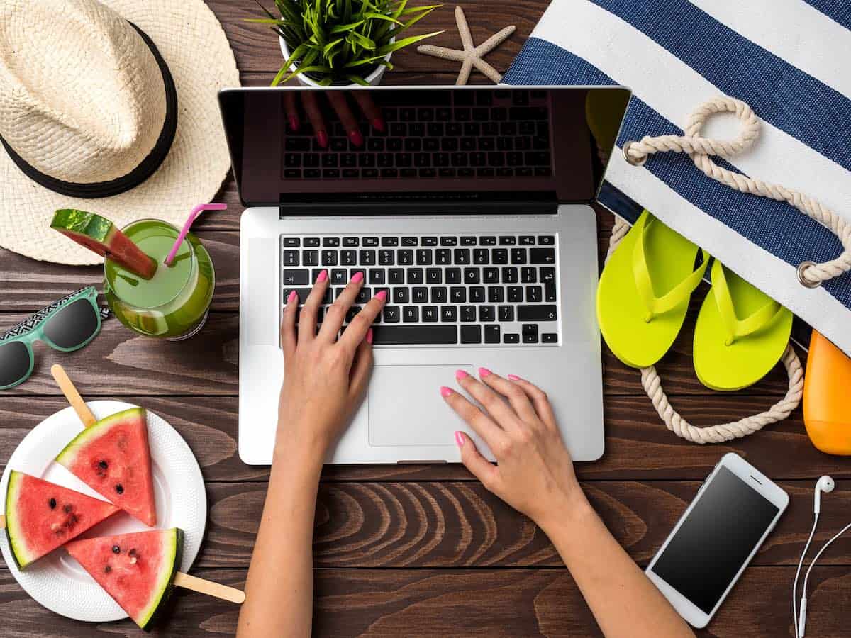 Person planning a trip to a tropical destination.