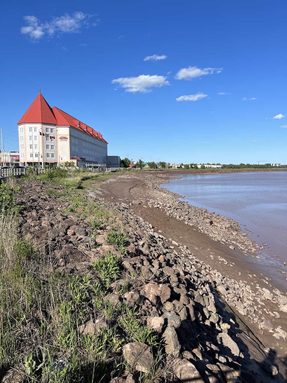 View of Chateau Moncton from the riverside trail. 